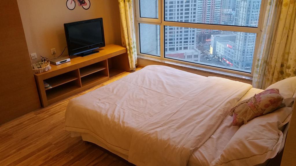 Dalian Yidian Yijing Huayuan Apartment Oda fotoğraf